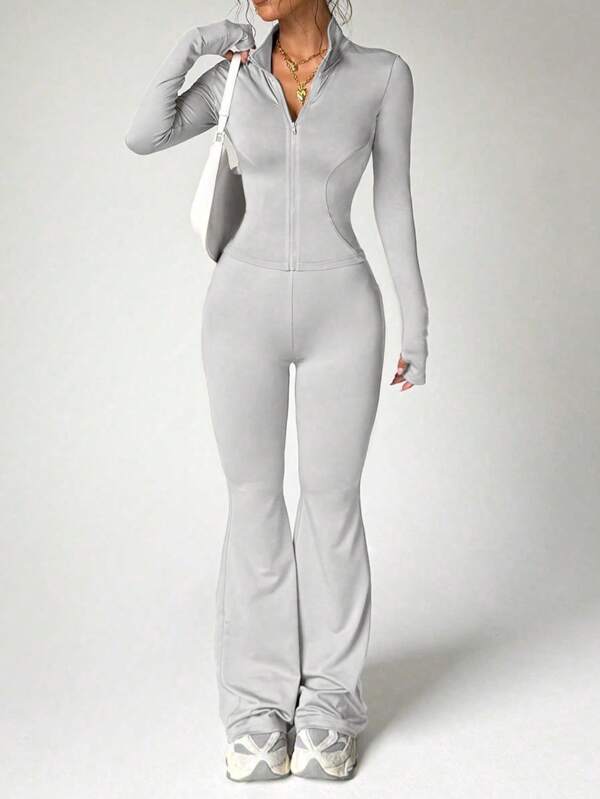 Conjunto activo de mujer con top de manga larga de unicolor y pantalones ajustados. Conjunto de entrenamiento para mujeres.