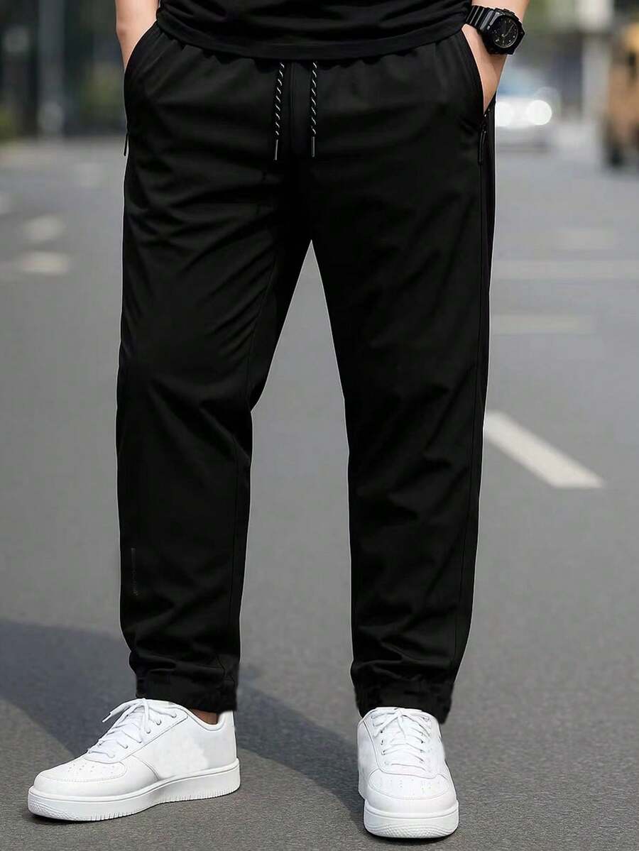 男士加大码宽松休闲运动裤，拉链口袋，抽绳腰带，修身显瘦，适合日常穿着和运动 - 轻便透气，适合春夏穿着