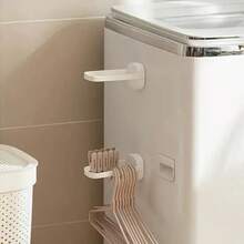 1 件装壁挂式折叠衣架，多功能塑料收纳整理架，未涂漆表面，适用于浴室和阳台，节省空间的洗衣方案，安装简便，现代简约设计，适用于小户型的多功能家居收纳架，轻巧坚固，耐腐蚀防锈塑料材质，易于清洁，可调节挂钩，包含安装配件，适合紧凑型公寓，提升收纳整理效果，透气晾干，防止杂乱，适用于毛巾、衣物和配件。