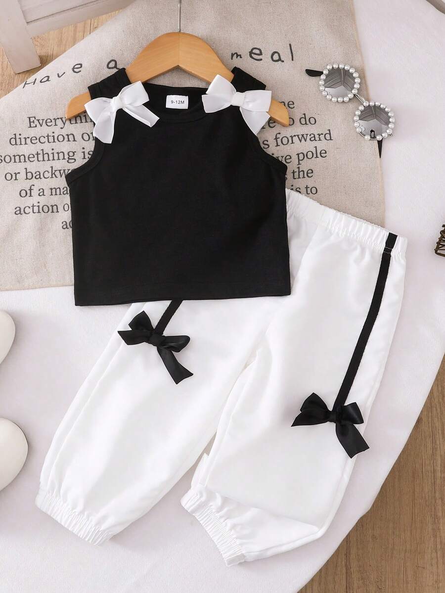 2 件夏季女婴无袖上衣和慢跑裤套装，时尚休闲百搭风格，白色蝴蝶结装饰上衣和黑色蝴蝶结细节慢跑裤，适合生日派对、周末郊游、学龄前表演 - 黑與白 - 查看 1