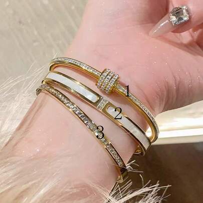 Braccialetto di lusso in acciaio inossidabile con design in zirconia cubica e conchiglia, elegante e gioiello da donna
