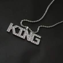 Collar con colgante "REY" encrusted de diamantes con cadena de cuerda