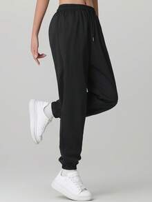 3 piezas Pantalones casuales de mujer de unicolor con cordón y bolsillo, versátiles para uso diario, senderismo, correr, ciclismo, trekking, primavera deportiva en color negro - Negro - Ver 6