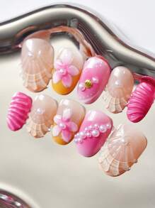 24 PIEZAS Uñas postizas ovaladas cortas en tonos nude rosa y naranja ombré con decoraciones de concha 3D, margarita y perla - Kit de puntas de uñas falsas de calidad de salón reutilizables con pestañas adhesivas y lima mini para uso diario, fiestas de playa y celebraciones de mujeres