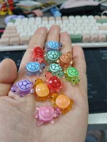 10/20 piezas de decoraciones de mini tortugas de mar que brillan en la oscuridad de colores aleatorios - Adorables adornos de resina de tortugas de mar para decorar pasteles, favores de fiesta de océano y manualidades de jardinería, regalos de cumpleaños y graduación - Multicolor - Ver 7