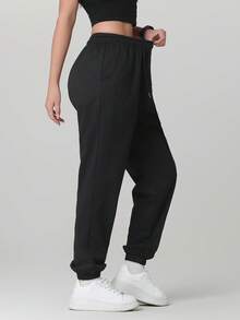 3 piezas Pantalones casuales de mujer de unicolor con cordón y bolsillo, versátiles para uso diario, senderismo, correr, ciclismo, trekking, primavera deportiva en color negro - Negro - Ver 5