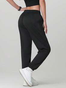 3 piezas Pantalones casuales de mujer de unicolor con cordón y bolsillo, versátiles para uso diario, senderismo, correr, ciclismo, trekking, primavera deportiva en color negro - Negro - Ver 4