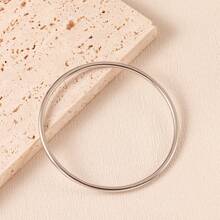 1 pieza Pulsera clásica y popular de acero de titanio sólido con superficie lisa chapada en oro de 18K, pulsera para mujer que no se desvanece
