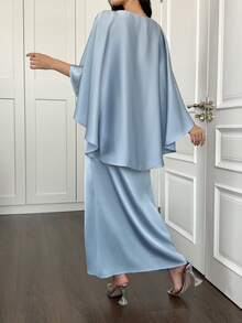 Elegant Dress For New Year's Eve, Paired With A Captivating Cape-Style Shawl And Discreet Zipper Details, Exuding A Refined And Sophisticated Aura.