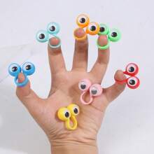 Set de 6/12/24/36/100 piezas de anillos de títeres de dedo con ojos saltones, juguetes de dedo con ojos móviles, relleno de regalo, bolsa de caramelos, regalo de fiesta de cumpleaños, premio de clase, relleno de piñata (colores aleatorios)