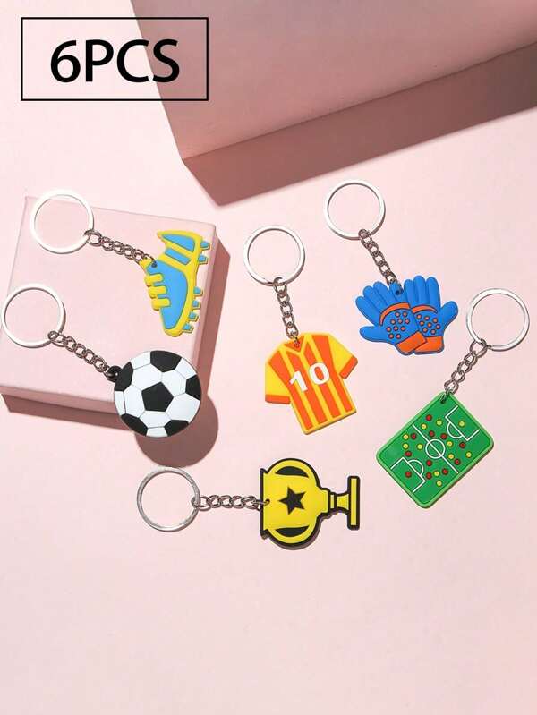 6 Stücke Jungen und Mädchen kreative Cartoon PVC Soft Leim Fußball WM Schlüsselanhänger, Nr. 10 Trikot, Baseball-Handschuhe, Fußball-Trophäenfeld Gepäckanhänger, Geburtstagsgeschenk