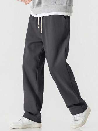 Pantalon droit tricoté noir grande taille pour hommes, pantalon décontracté ample tout-aller de couleur unie pour le printemps et l'automne
