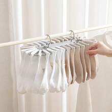 1 件晾衣架，用于晾晒衣服、袜子、内衣、鞋子和拖鞋的晾衣架，带多个夹子的收纳架