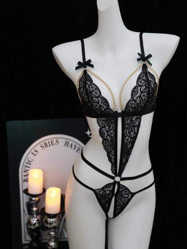 Conjunto de sostén de tirantes tipo suspensorio sin espalda y tanga, lencería sexy de encaje transparente con tirantes de portaligas
