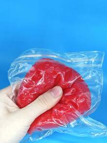 Juguete suave con forma de fresa grande y brillante, de material tipo silicona con aroma, hecho a mano para aliviar el estrés, de color rosa transparente con Top crema.