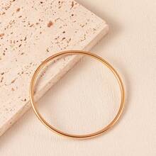 1 pieza Pulsera clásica y popular de acero de titanio sólido con superficie lisa chapada en oro de 18K, pulsera para mujer que no se desvanece