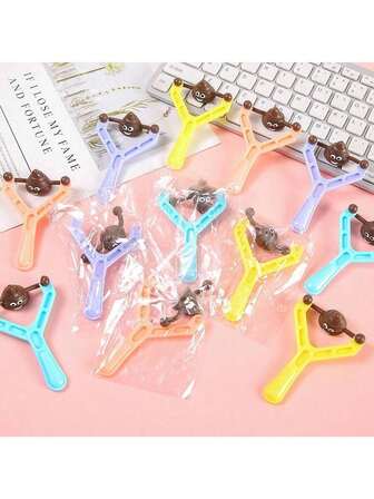 3pcs/6pcs/12pcs/24pc Fun Shooting Poop Game Toy Birthday Party Gift Giving Party Pinata Filling Carnival Party Gift Smiling Poop Slingshot Toy Mini Rubber Flying Poop Slingshot Stress Relief Toy