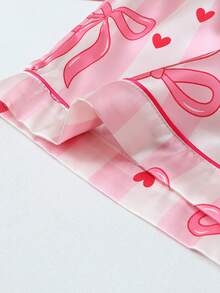 Conjunto de pijama de mujer de manga corta con estampado de rayas y lazo