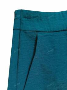 Ensemble deux pièces grande taille avec Top court à col en V et taille nouée, avec pantalon large. Décontracté et ajusté, parfait pour le printemps/été et le port quotidien