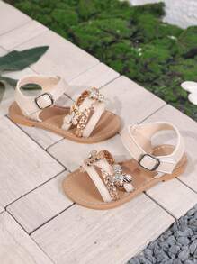 A Pair Of Summer Bow Princess Shoes, Fashionable And Versatile, Cross Woven Sandals With Flat Bottom And Soft Sole, Hook And Loop, Comfortable For External Wear