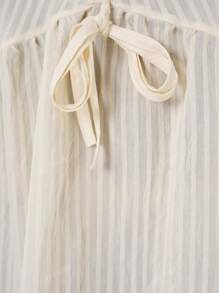 Blusa donna elegante con collo lavorato a costine annodata, tinta unita, adatta per il mare