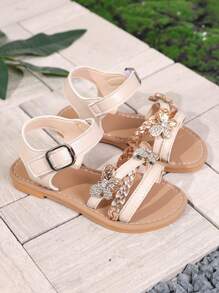A Pair Of Summer Bow Princess Shoes, Fashionable And Versatile, Cross Woven Sandals With Flat Bottom And Soft Sole, Hook And Loop, Comfortable For External Wear