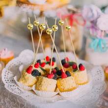 20/50/100/200/400 piezas Elegantes palillos de bambú para frutas con cuentas doradas en la parte superior - Perfectos para aperitivos, bebidas, frutas, canapés y bodas, decoración de bodas | Elegantes tenedores dorados para frutas | Palitos de bambú duraderos para bandejas de frutas y talla grande - Multicolor - Ver 9