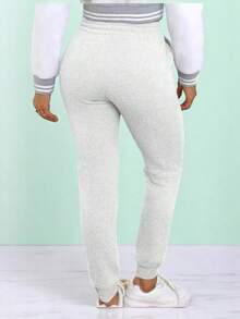 JOGGER AFELPADO LISO CASUAL CON BOLSAS IDEAL PARA TODO TIPO DE ACTIVIDAD     (F1B) - Gris Claro - Ver 3