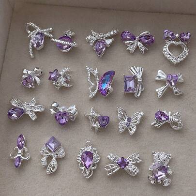 10/20 chiếc 3D tinh tế bạc hành tinh nơ trái tim móng tay trang trí mùa xuân hè sáng bóng màu tím đá giả trang trí móng tay hợp kim sao trăng bướm gấu đá quý tự làm móng tay thích hợp cho móng tay ép acrylic ốp điện thoại giày dép quần áo túi xách dụng cụ làm móng nghệ thuật