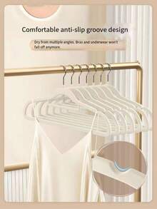 20 piezas de perchas con felpa, sin costuras, amigables con los hombros, antideslizantes, organizadores del hogar para redes de ropa, ganchos para ropa de niños, perchas de plástico grueso para ropa - Percha flocada para ropa infantil - Ver 4