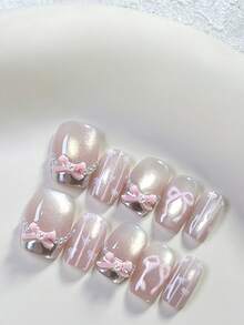 每套10片手工方形短假指甲，银色法式设计，亮粉色猫眼手绘蝴蝶结图案，粉色风格可爱女孩，可重复使用，含工具，可作为女性节日和生日的礼物，适合任何风格的女性日常佩戴 - 彩色 - 查看 3