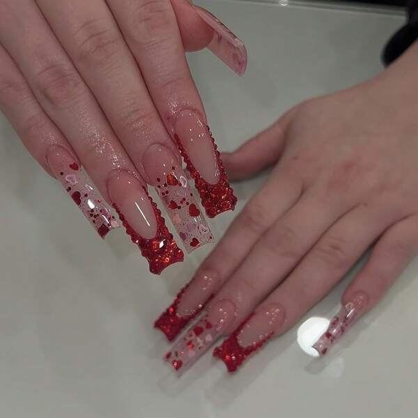 A Set Of Ten Handmade Full-Cover Nail Stickers For Women, Featuring Reusable Square-Shaped Designs With Sparkling Red Heart Rhinestones, Perfect For Cute And Shiny Nail Art.