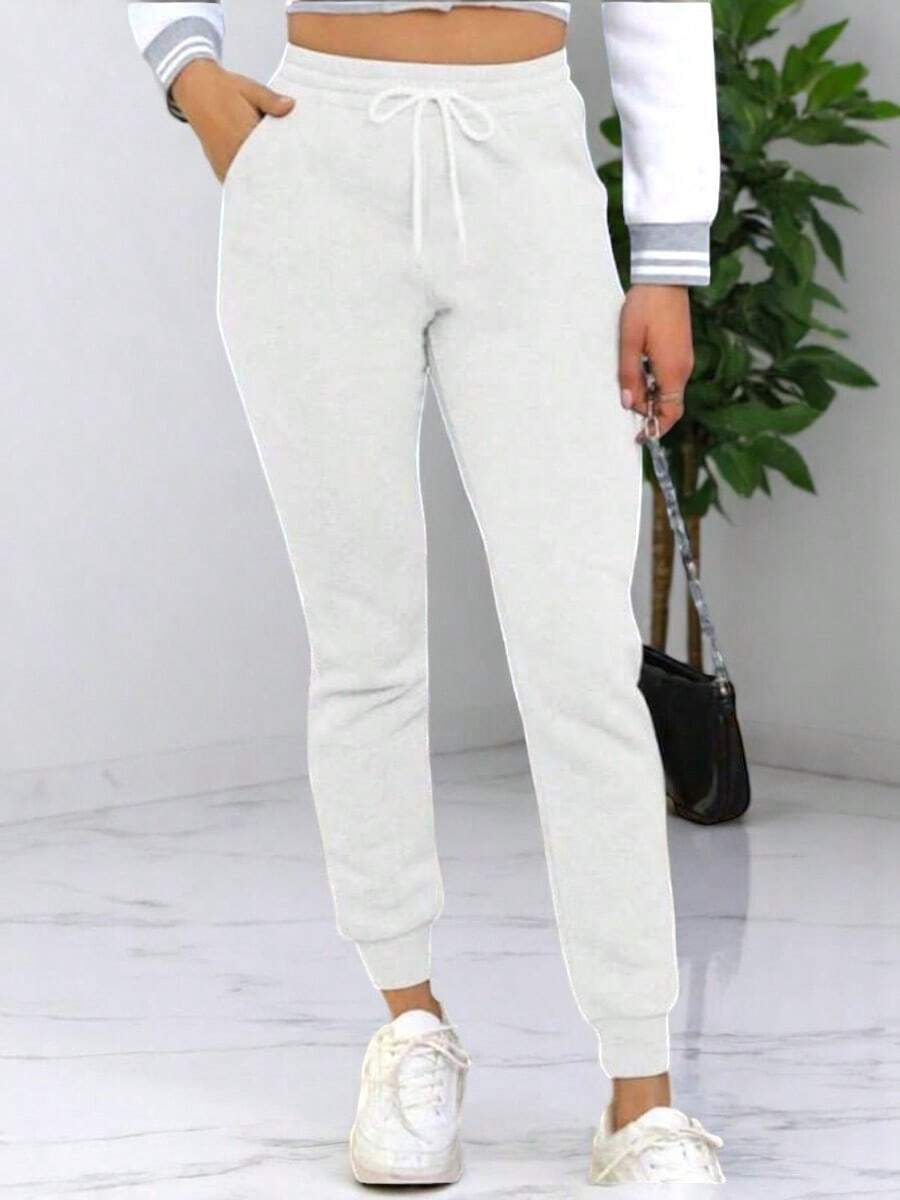 JOGGER AFELPADO LISO CASUAL CON BOLSAS IDEAL PARA TODO TIPO DE ACTIVIDAD (F1B) - Gris Claro - Ver 1