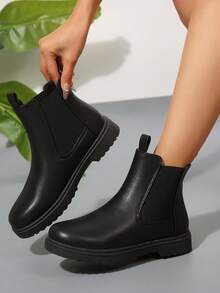 女士时尚休闲黑色 PU 一脚蹬圆头弹力平底切尔西踝靴，百搭秋冬款，女靴