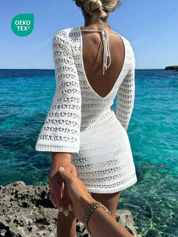 Robe courte bohème unie à dos nu et manches longues ajourées pour femme, décontractée et à la mode, idéale pour le printemps et l'été.