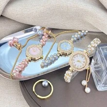 1 pièce Montre femme au boîtier en alliage orné de strass tréfle, avec chaîne double perle réglable, cadran avec chiffres arabes, quartz, style pastoral
