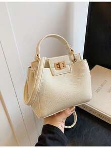 新款时尚休闲按扣锁手提包，适合聚会、郊游、购物和日常使用，可容纳硬币、手机，也可作为办公室女士、大学生、女士的工作包，优雅