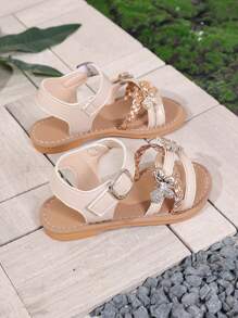 A Pair Of Summer Bow Princess Shoes, Fashionable And Versatile, Cross Woven Sandals With Flat Bottom And Soft Sole, Hook And Loop, Comfortable For External Wear