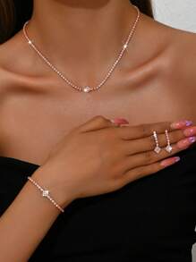 Ensemble de bijoux à la mode et luxueux, composé d'une chaîne de clavicule, de boucles d'oreilles, d'un collier et d'un bracelet, idéal pour un usage quotidien, un mariage, un banquet ou une fête.
