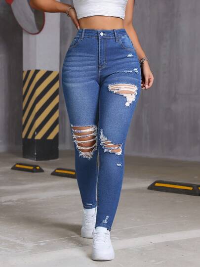 高品质女士修身弹力牛仔裤，做旧细节设计，简约时尚，适合日常休闲穿着和圣诞节等场合。