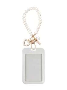 这款黑/白/粉色卡包配有心形吊坠和仿珍珠链，可用作包包装饰、钥匙扣，可收纳身份证、会员卡、照片、地址卡，并起到保护作用。适合日常使用、装饰，或作为礼物送给朋友、家人、爱人，也适合情人节、生日、母亲节、开学季等场合。 - 彩色 - 查看 13