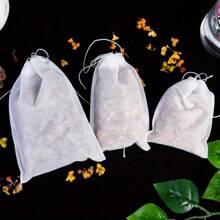100 pièces de sacs non tissés à cordon de serrage. Sacs pratiques de filtration pour les sachets de thé, la séparation des décoctions de médecine chinoise et des saumures. Sacs non tissés jetables à cordon de serrage.
