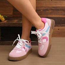 1 par de zapatos deportivos ligeros de estilo universitario asimétrico/asimétrico de tela con diseño de dibujos animados, adecuados para la universidad, vacaciones y todas las temporadas