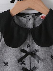 女童幼儿时尚可爱领口无袖蝴蝶结花卉印花连体裤