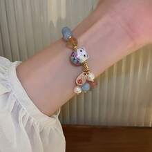 Bohemian Style Cute Ladies' Bracelet With Blue Stone Beads, Ceramic Cat Pendant, And Gold Accents - Lightweight And Durable Wristband Suitable For Casual Wear - Mèo may mắn - Xem 7