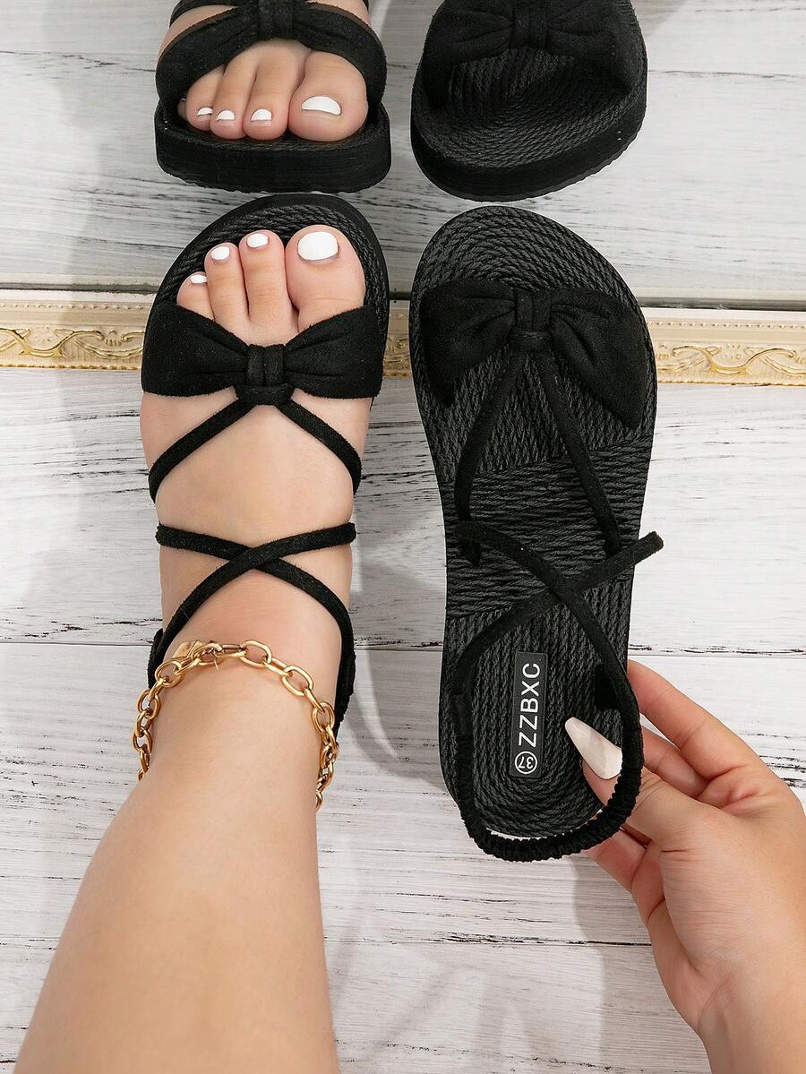 黑色蝴蝶结宽楦凉鞋（适合脚围较宽的顾客，比标准脚围大两码）法式优雅、可爱、高端罗马平底凉鞋，适合女士夏季户外穿着，仙气十足。2025新款美式舒适透气优雅沙滩凉鞋/大码女鞋，宽楦设计。 - 黑色 - 查看 1