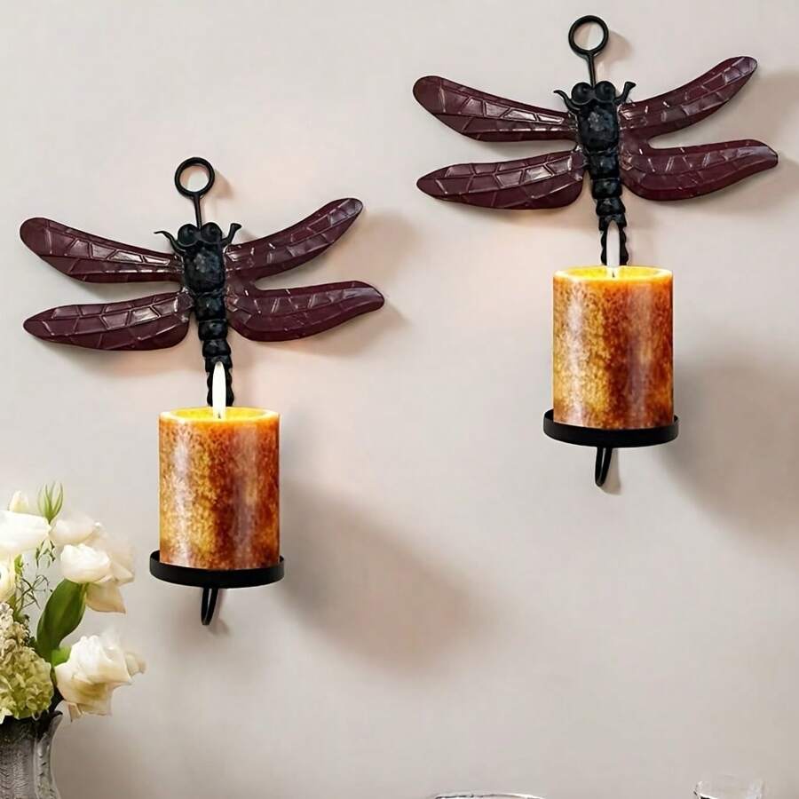 Set de 2 portavelas de pared con diseño de libélula, capaz de sostener velas con un diámetro máximo de 2.25"