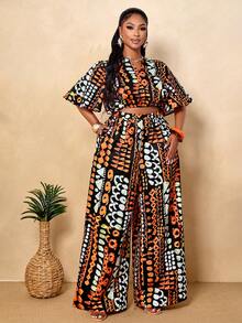 BIUBIU Bộ đồ nữ cỡ lớn, kiểu dáng thường ngày, gợi cảm, thanh lịch, họa tiết nhiệt đới châu Phi màu đen, áo cổ chữ V và quần ống rộng (họa tiết ngẫu nhiên) mùa hè. - Màu cam đậm - Xem 2