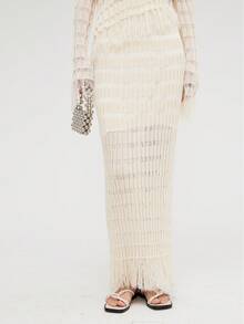 Falda de suéter de punto ajustada de alta gama y diseño único para mujer