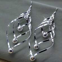 1 Paar gedrehter geometrischer Hänge-Ohrringe mit Metallspirale, dreifachem Kreis, verwirbeltem geschichtetem Ohrpiercing-Design, Anhänger-Ohrringe mit Silberplattierung für Damen und Mädchen für den täglichen Gebrauch